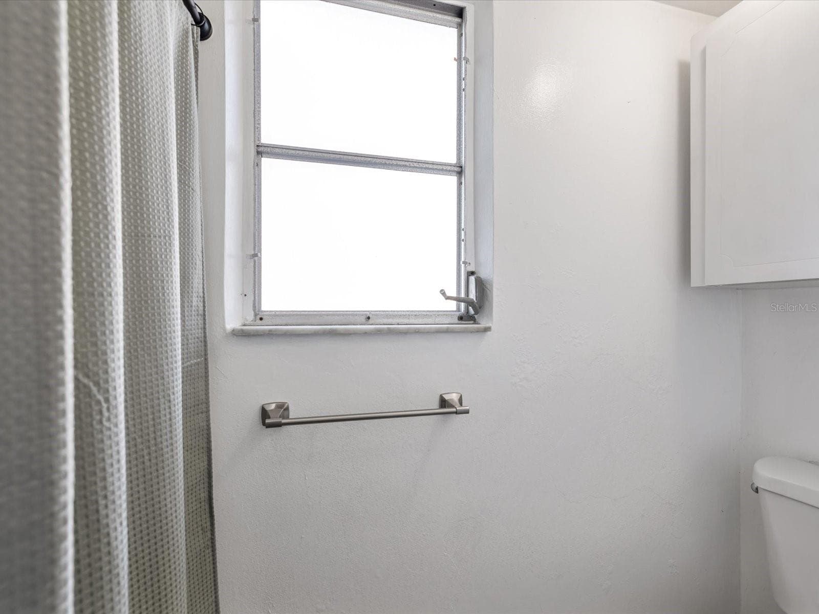Secondary bathroom with fully remodeled shower - 2000 57TH ST N, ST PETERSBURG