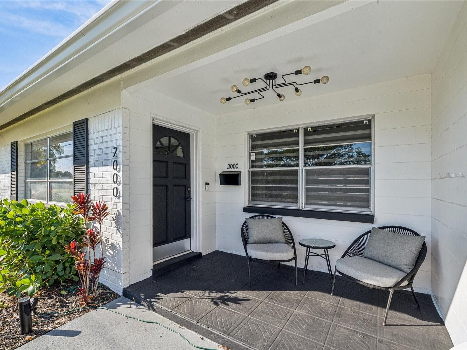 Inviting front porch - 2000 57TH ST N, ST PETERSBURG