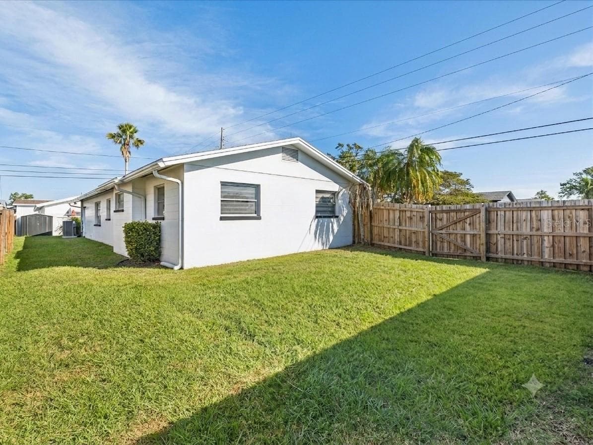 Large fenced backyard. - 2000 57TH ST N, ST PETERSBURG