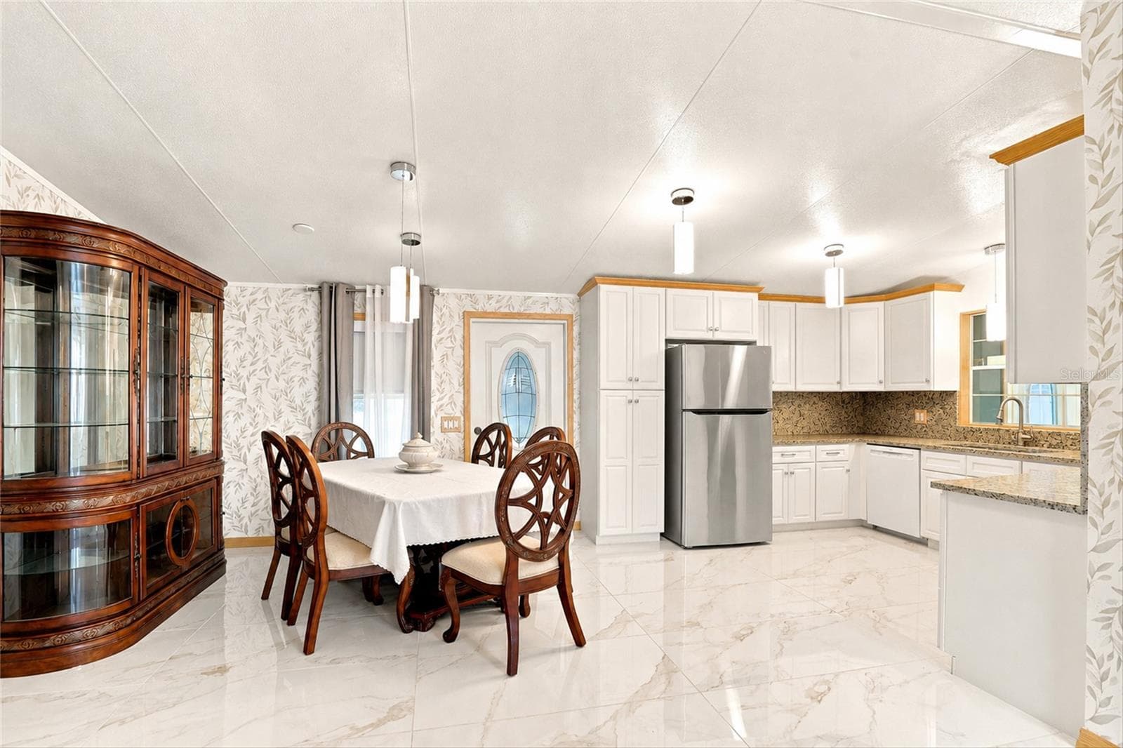 Kitchen and Dining Area - 1 POINSETTIA DR, FORT MYERS