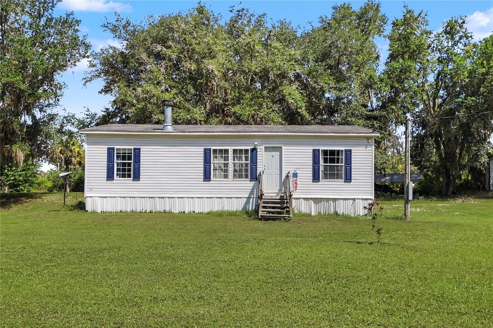 Manufactured Home at 5435 NE 153RD PLACE RD, CITRA, photo 2 of 43