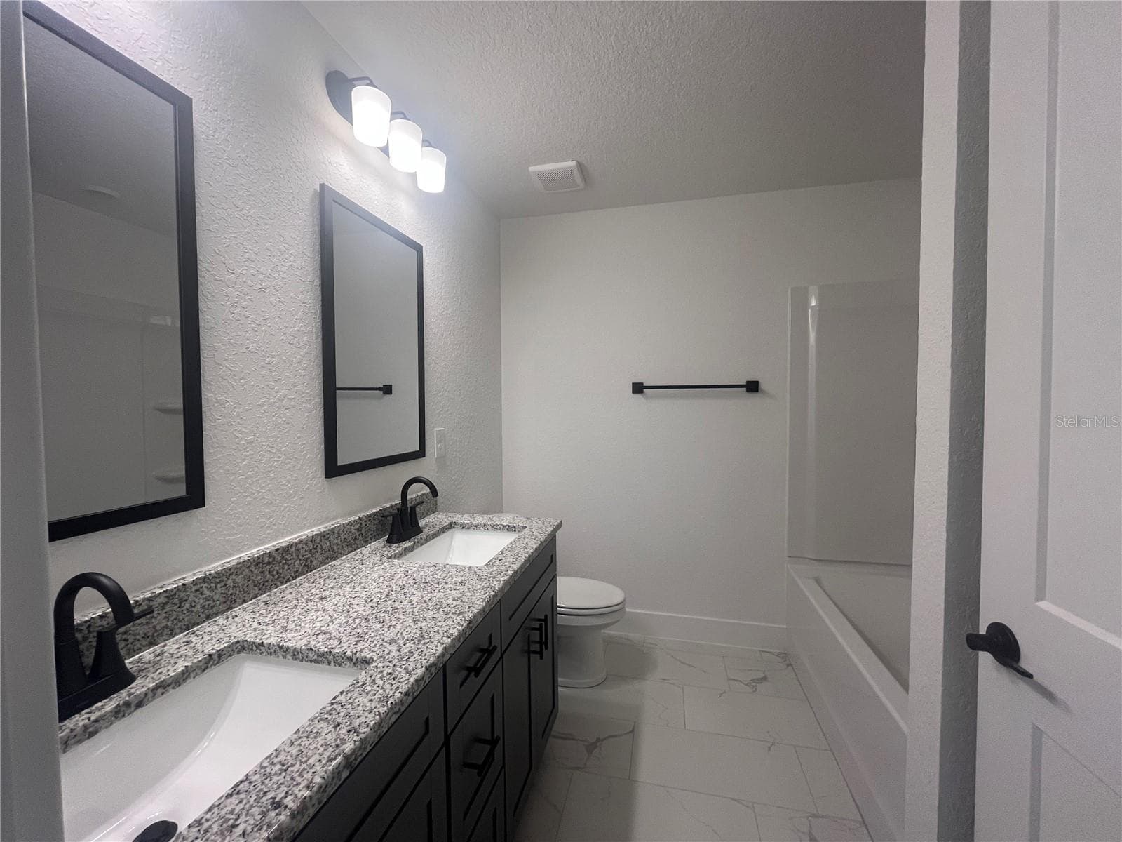 Under construction. Photos are from the same model in another community and are for reference only. Colors will vary. - 18 HEMLOCK TERRACE TRL, OCALA