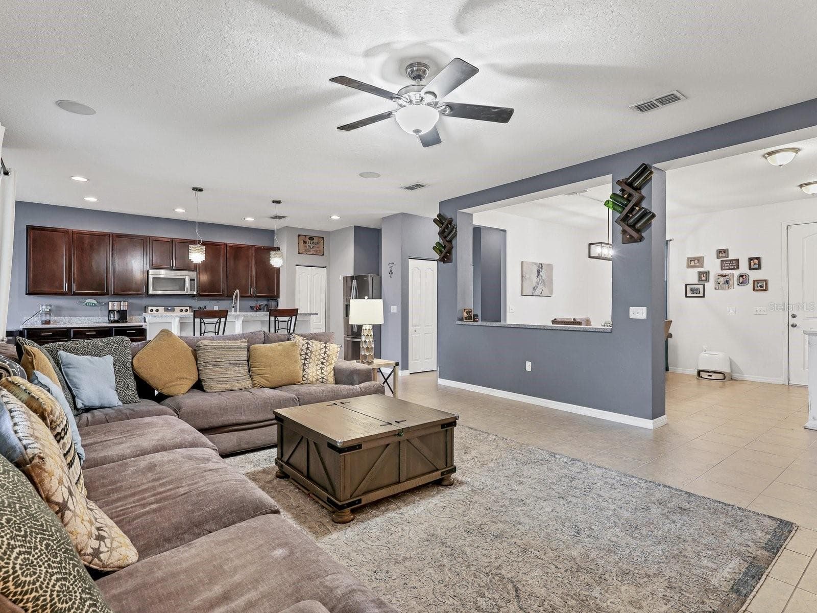view from living room to front door/dining room - 6307 4TH ST E, BRADENTON