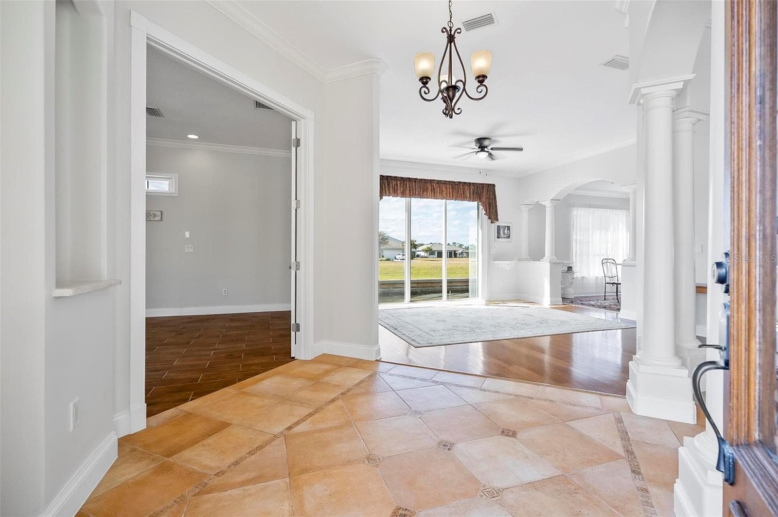 Model home has custom columns and custom crown moldings throughout - 88 HIDDEN CV, FLAGLER BEACH