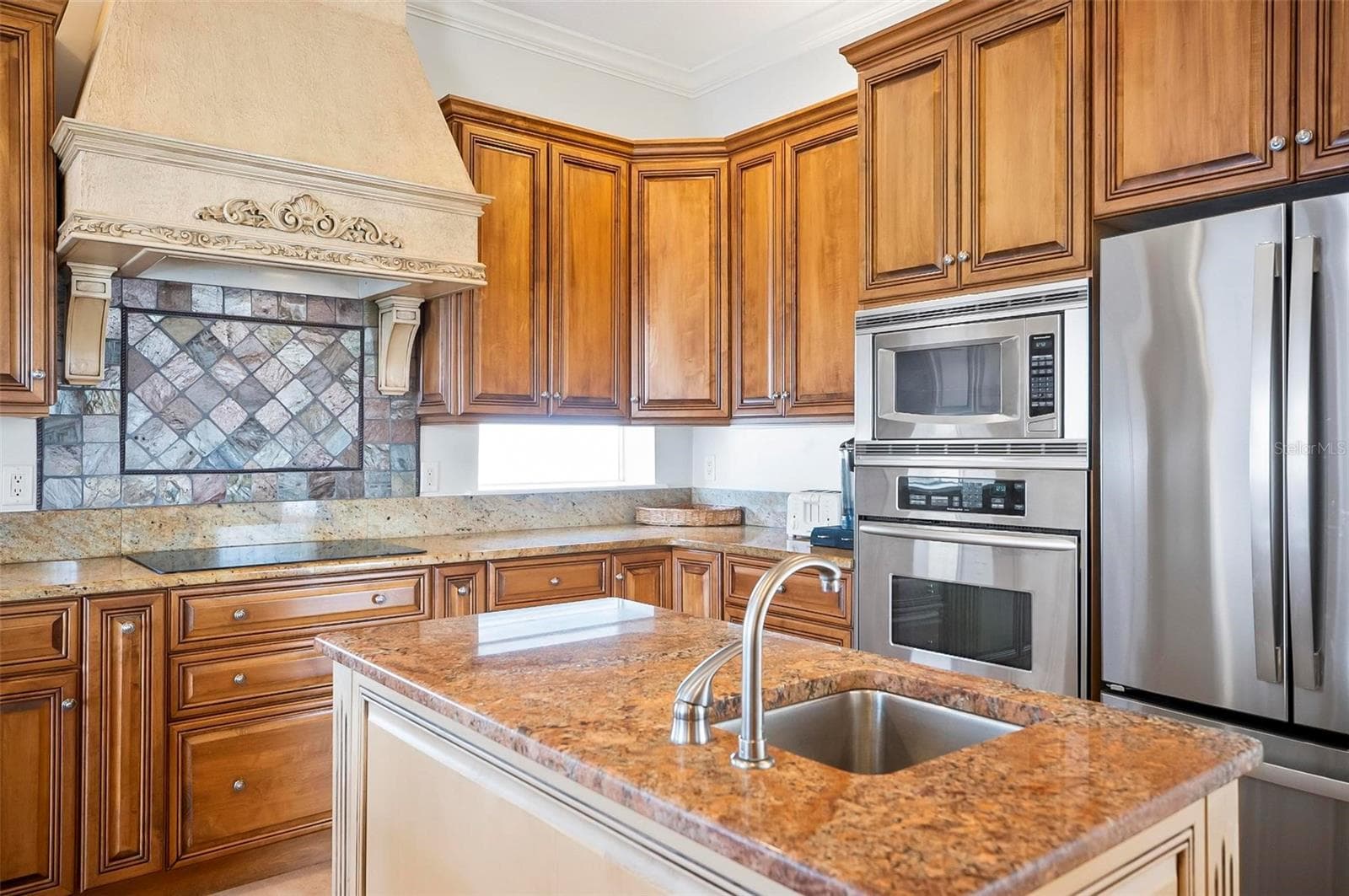 Under cabinetry windows make the kitchen light and bright - 88 HIDDEN CV, FLAGLER BEACH