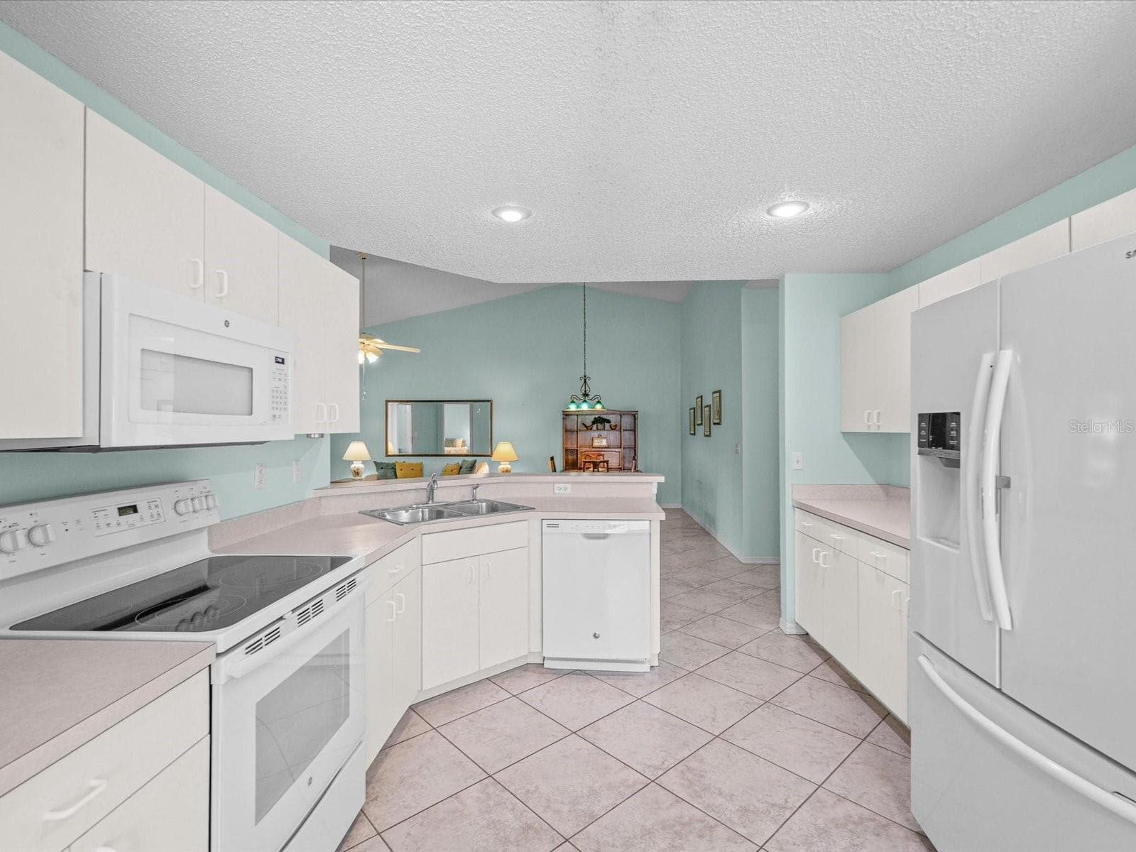 Another view of kitchen from Breakfast Area - 830 MCCALLISTER AVE, SUN CITY CENTER