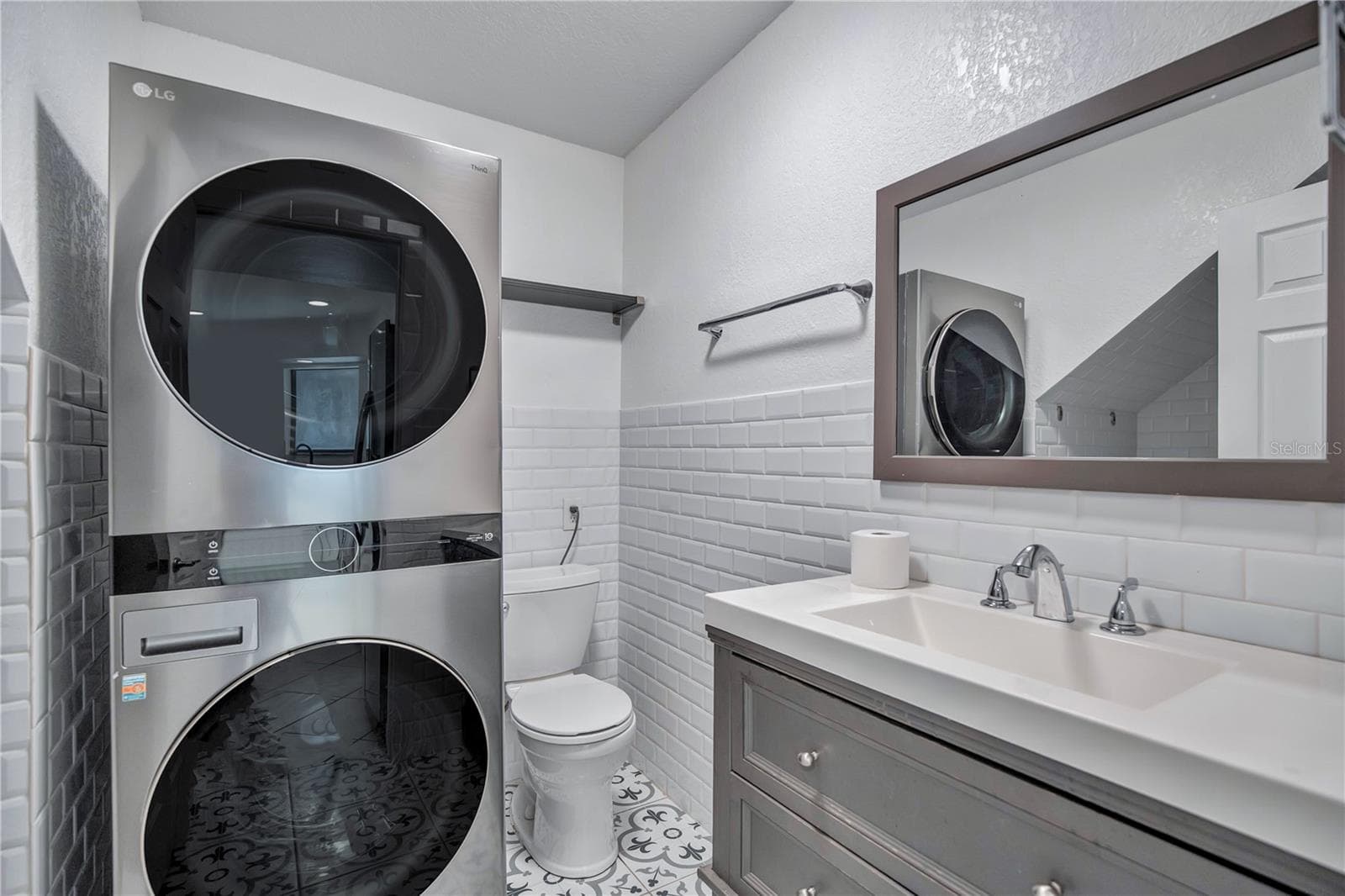 Bathroom, laundry room Downstairs - 2577 DERBYSHIRE CIR, CASSELBERRY