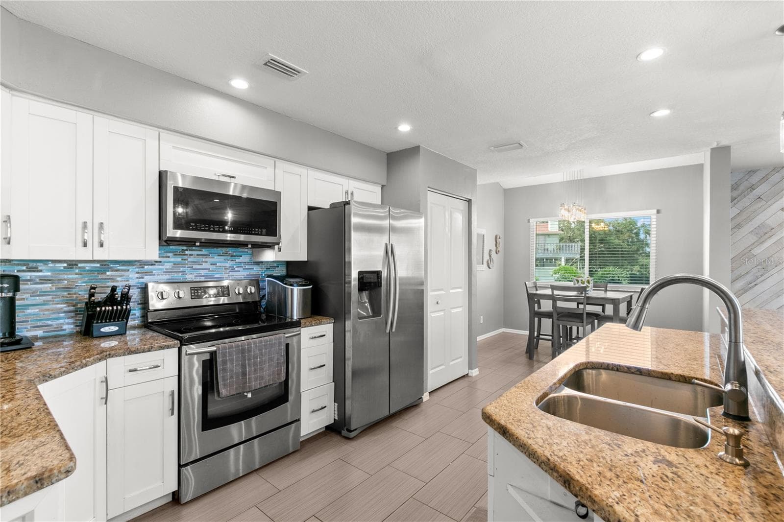 2nd Level-Living Room/Kitchen/Dining Room Combo - 2376 HANOVER DR, DUNEDIN