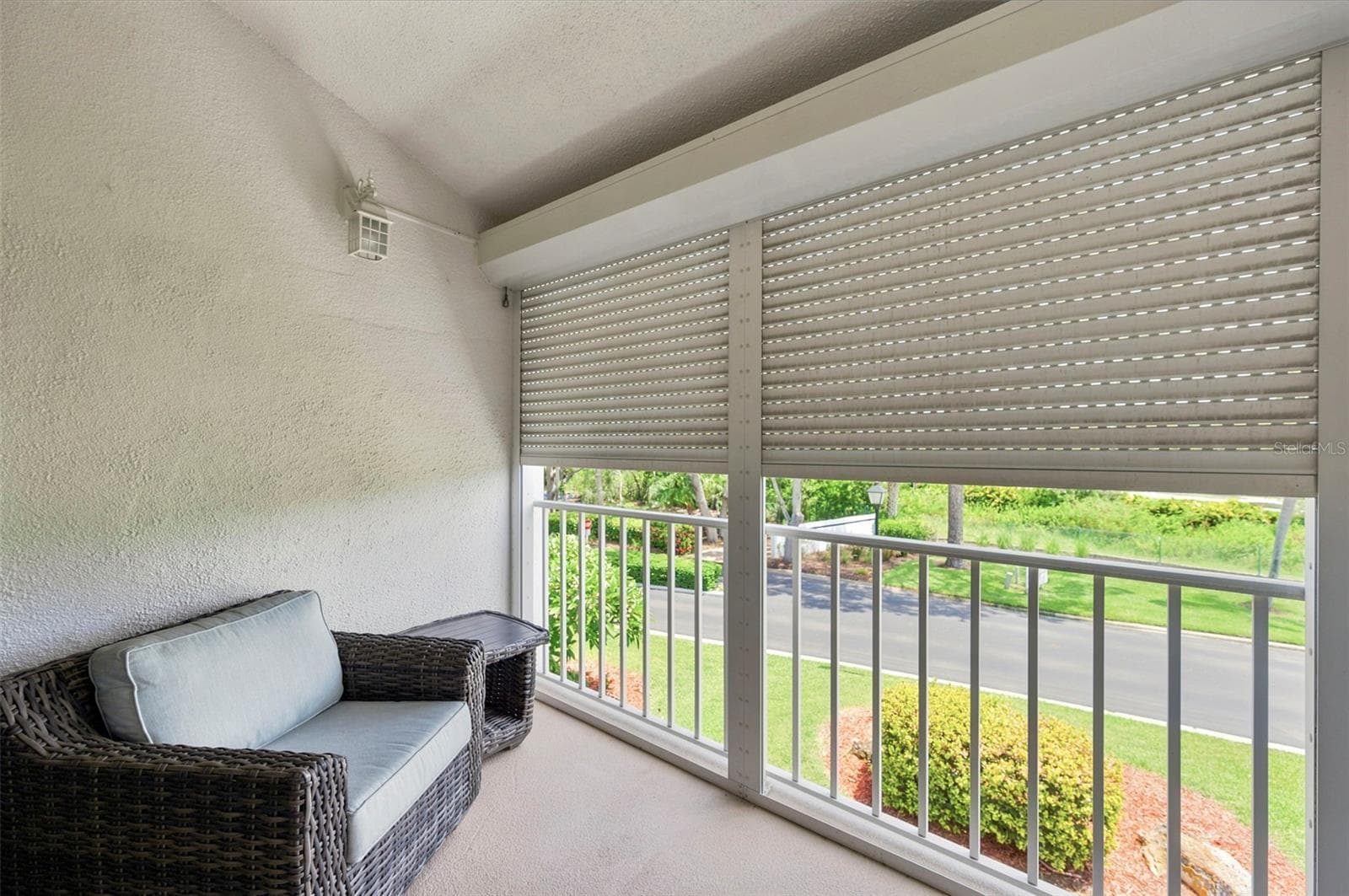 Hurricane shutters- half closed - 14800 WALSINGHAM RD #614, LARGO