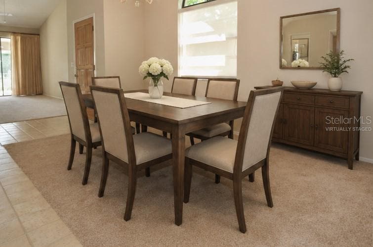 Virtually staged Dining room - 5565 SALEM SQUARE DR N, PALM HARBOR