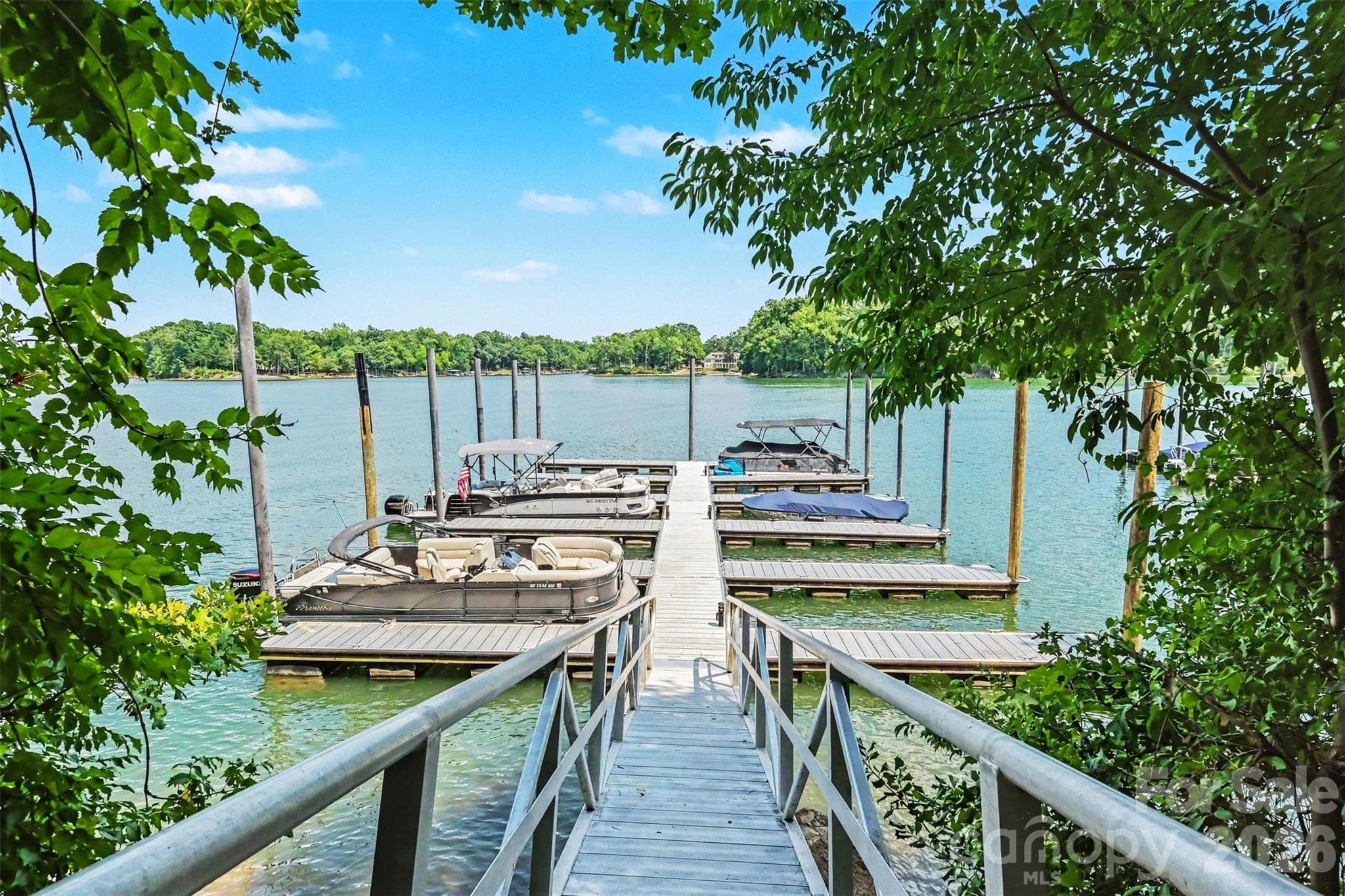 View of private docks and beautiful lake. - 109 Whiterock Drive, Mount Holly