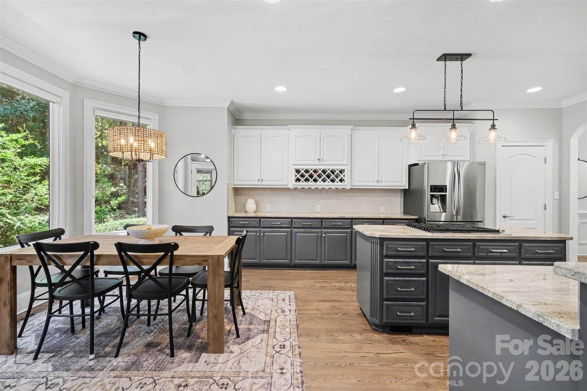 Bright breakfast area with easy access to the Easy Breeze ($-season) Sunporch. - 109 Whiterock Drive, Mount Holly