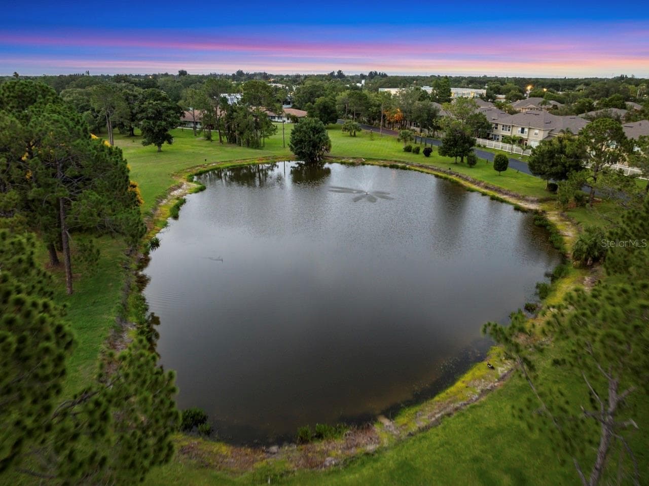 POND VIEW FROM YOUR BEDROOM, KITCHEN, AND KITCHEN TABLE. - 8235 BURGUNDY DR N #3, PINELLAS PARK