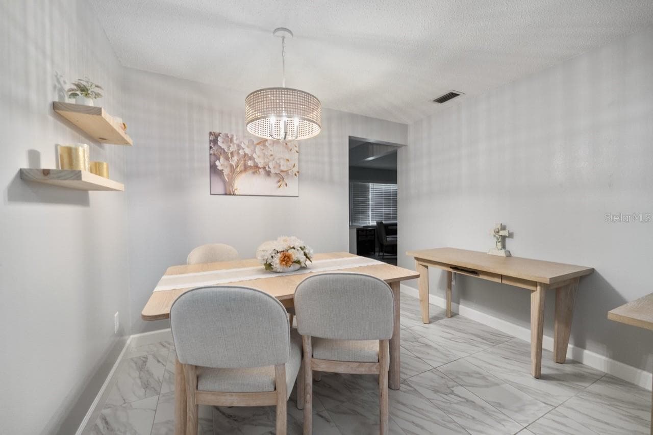 DINING ROOM, LOOK AT THIS LIGHTING - 8235 BURGUNDY DR N #3, PINELLAS PARK