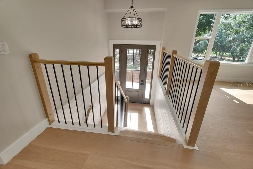 Beautiful stairway and railing - 1530 DEERMOSS LN, DELAND