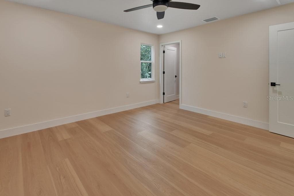 Master bedroom with closet entry - 1530 DEERMOSS LN, DELAND