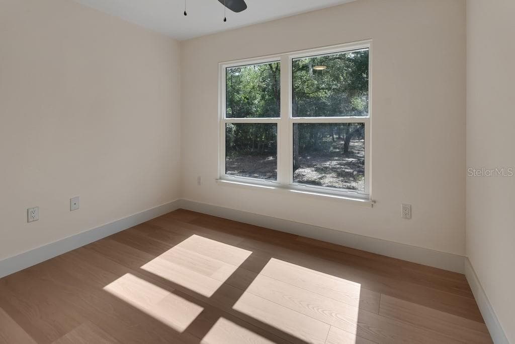 Bedroom 2. Great natural light. - 1530 DEERMOSS LN, DELAND