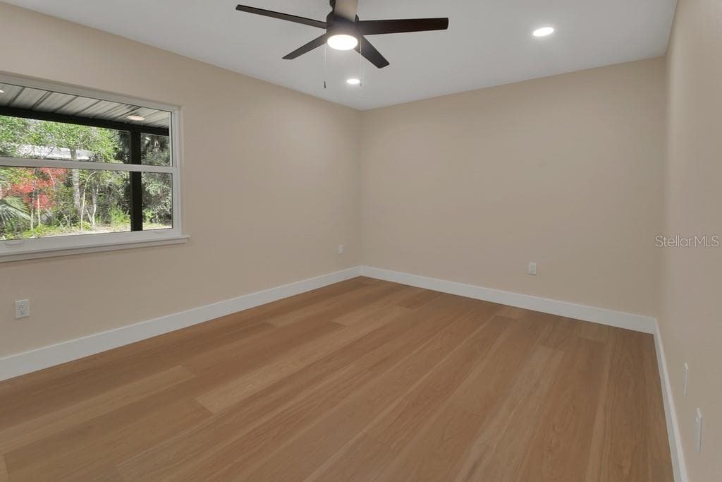 Spacious Bedroom 4-downstairs - 1530 DEERMOSS LN, DELAND
