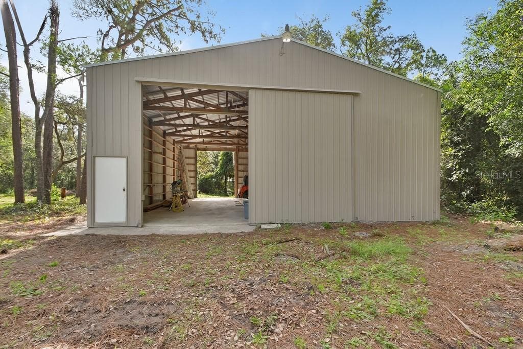 40x50 metal shop with drive through doors - 1530 DEERMOSS LN, DELAND