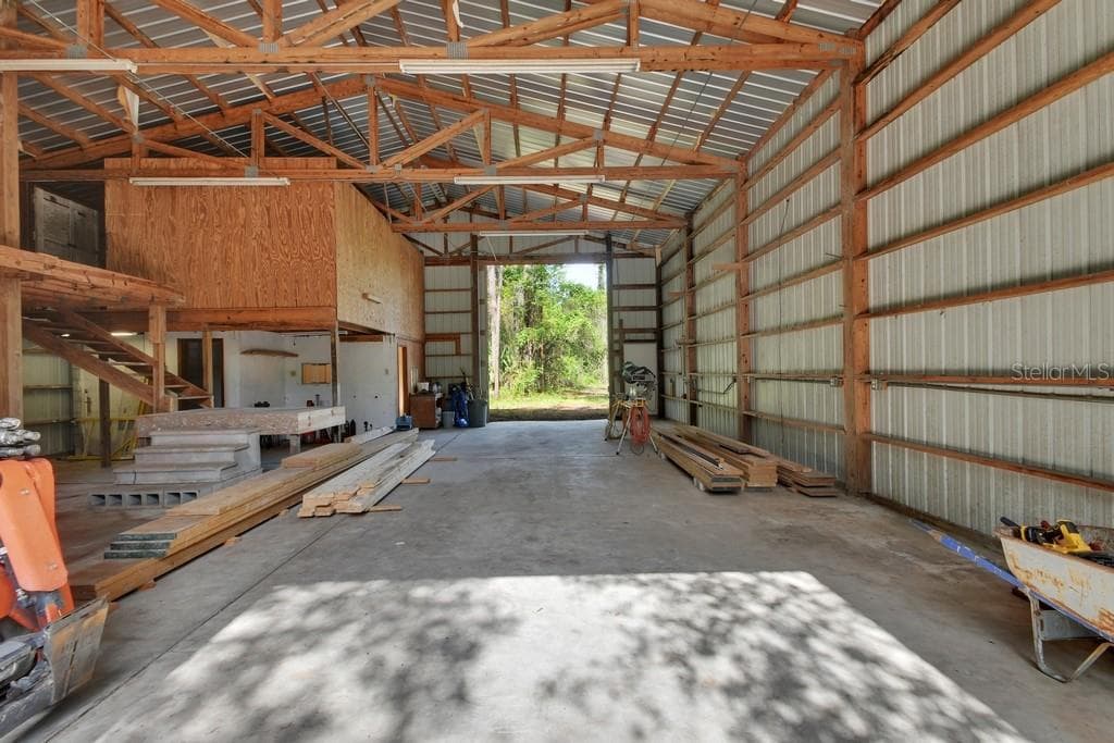 There is a room upstairs and a loft area. - 1530 DEERMOSS LN, DELAND