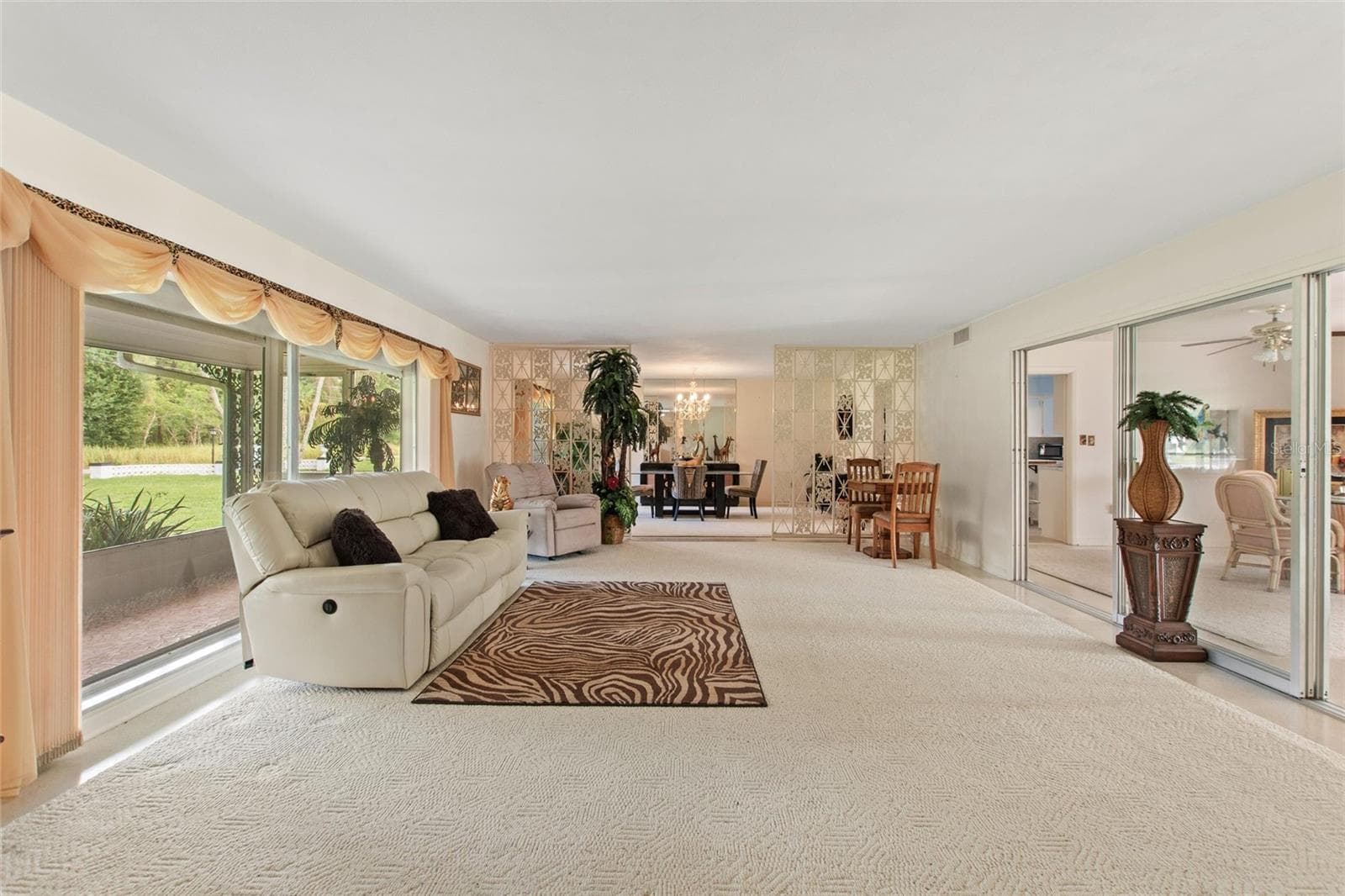 Beautiful formal living and dining rooms! - 6197 AMARYLLIS DR, INDIAN LAKE ESTATES