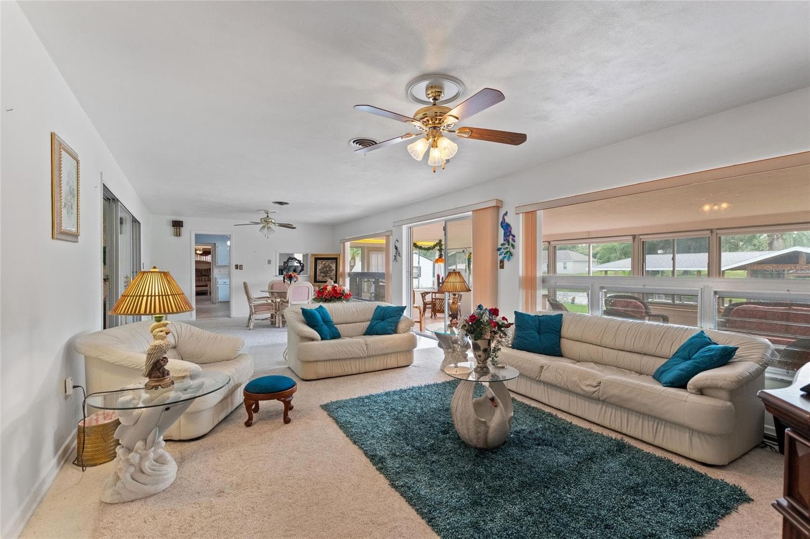 Large family room and informal eating areas. - 6197 AMARYLLIS DR, INDIAN LAKE ESTATES