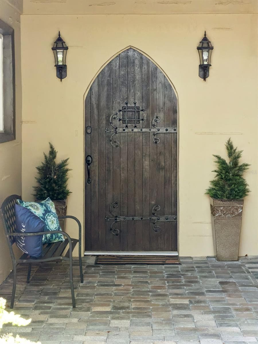 Step through a beautiful antique church door, rich with history and craftsmanship, and immediately feel that you’re entering somewhere truly special - 1629 HEMPEL AVE, WINDERMERE