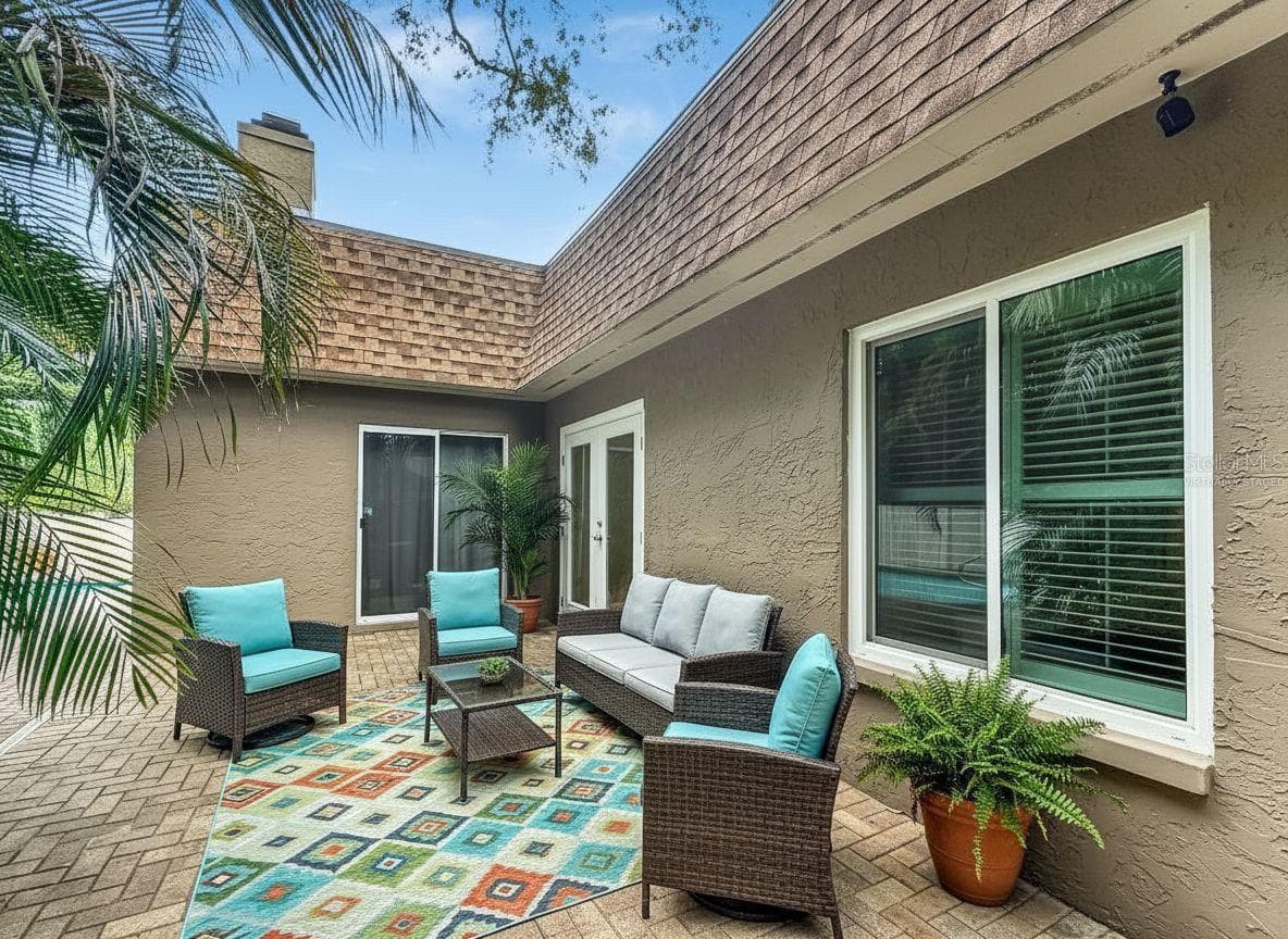Virtually Staged - Back Patio - 1011 WINDING OAKS DR, PALM HARBOR