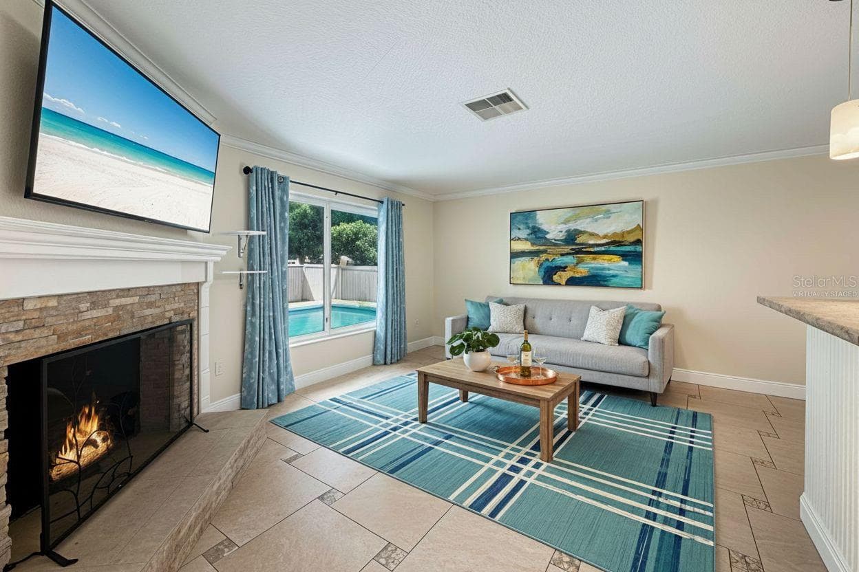 Family Room - Virtually Staged - 1011 WINDING OAKS DR, PALM HARBOR