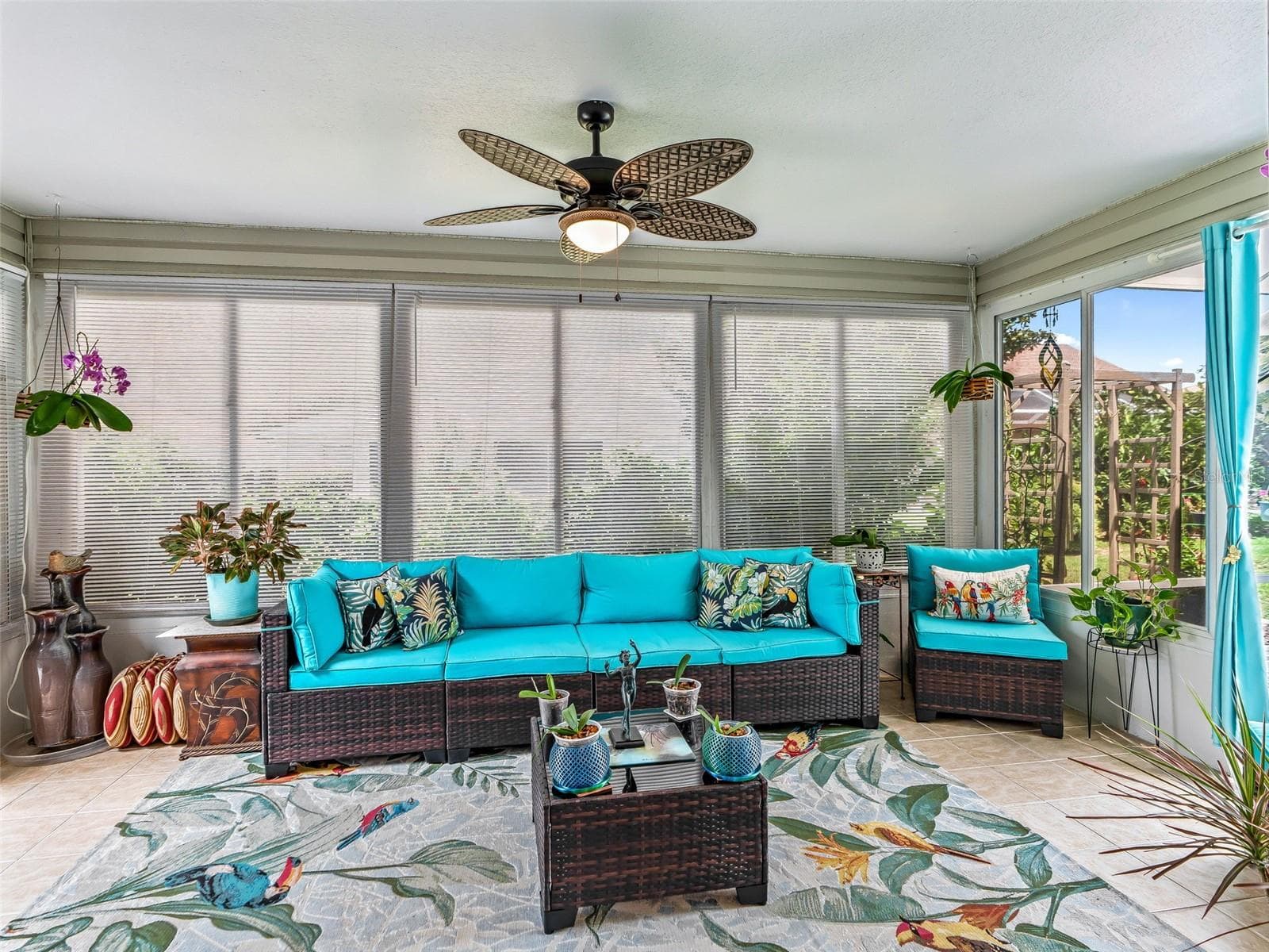 Bright part-enclosed lanai (Complete w/ its on thermostat and AC/Heat ventalation with choice to completely enclose)provides a comfortable year-round retreat with expansive screened windows, a ceiling fan, and plenty of room for lounging and entertaining. - 17946 SE 87TH MELROSE CT, THE VILLAGES