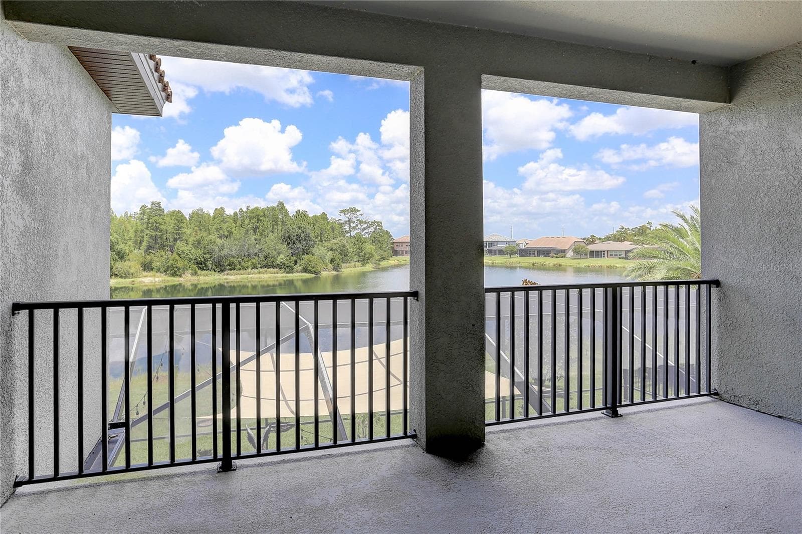 Owner's balcony off of bedroom - 18014 WOODLAND VIEW DR, LUTZ