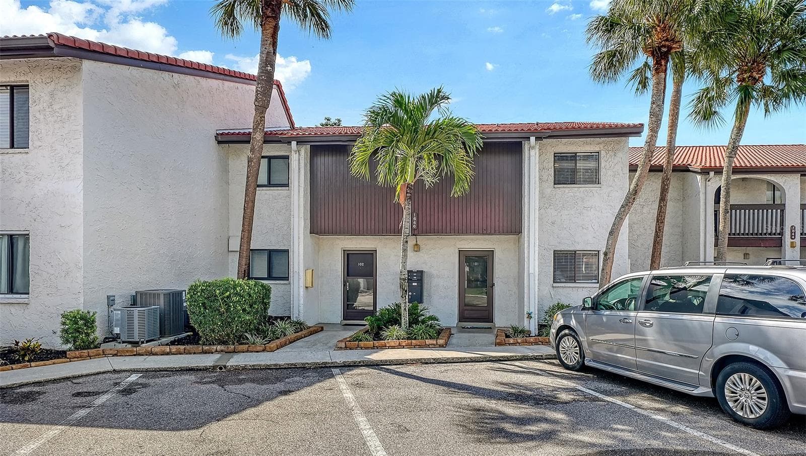 Building #1646, Unit #101 front door on the right. Deeded and assigned parking space number 163 right in front. - 1646 STICKNEY POINT RD #101, SARASOTA