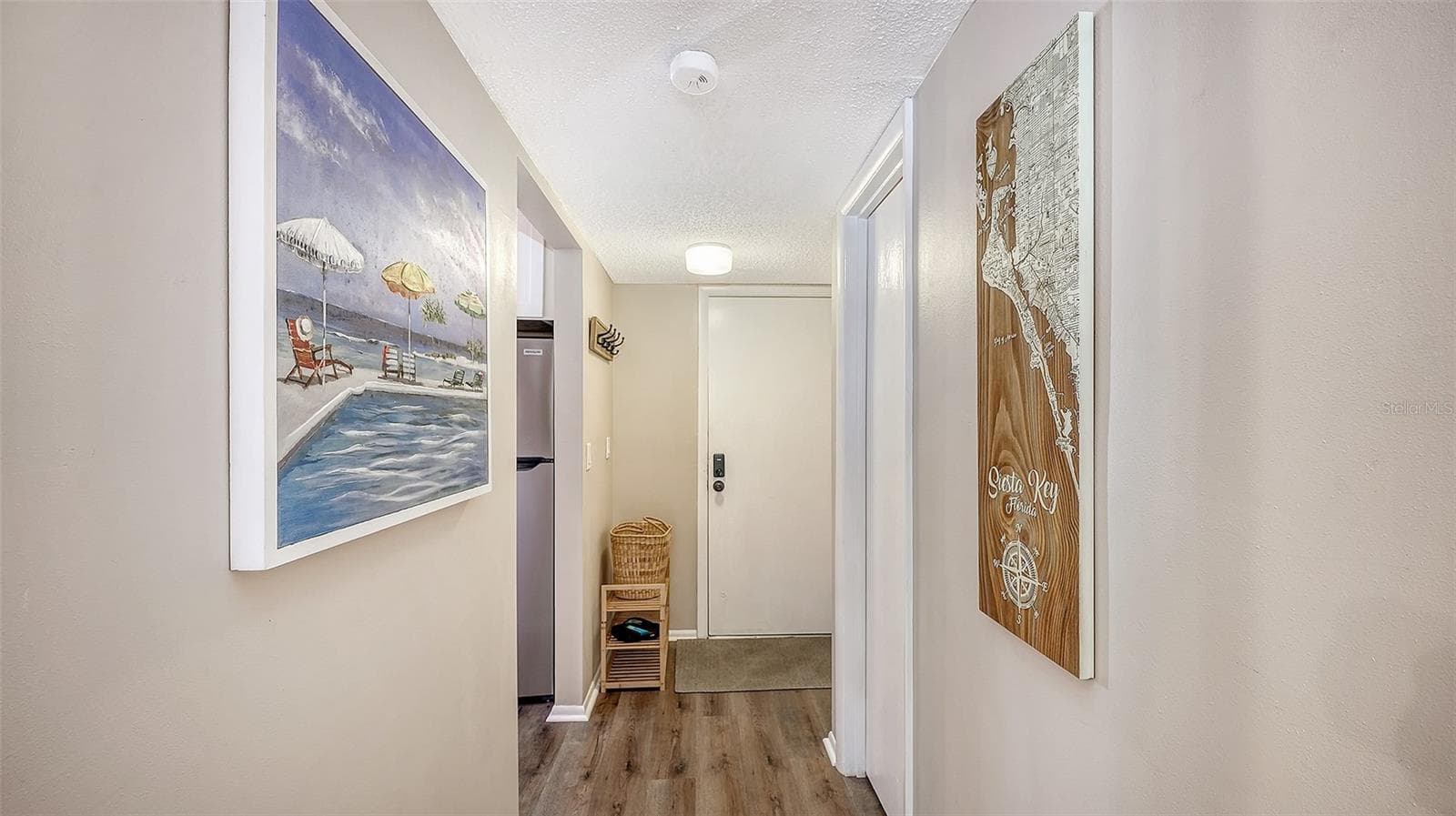 Unit #101 entry hallway. - 1646 STICKNEY POINT RD #101, SARASOTA