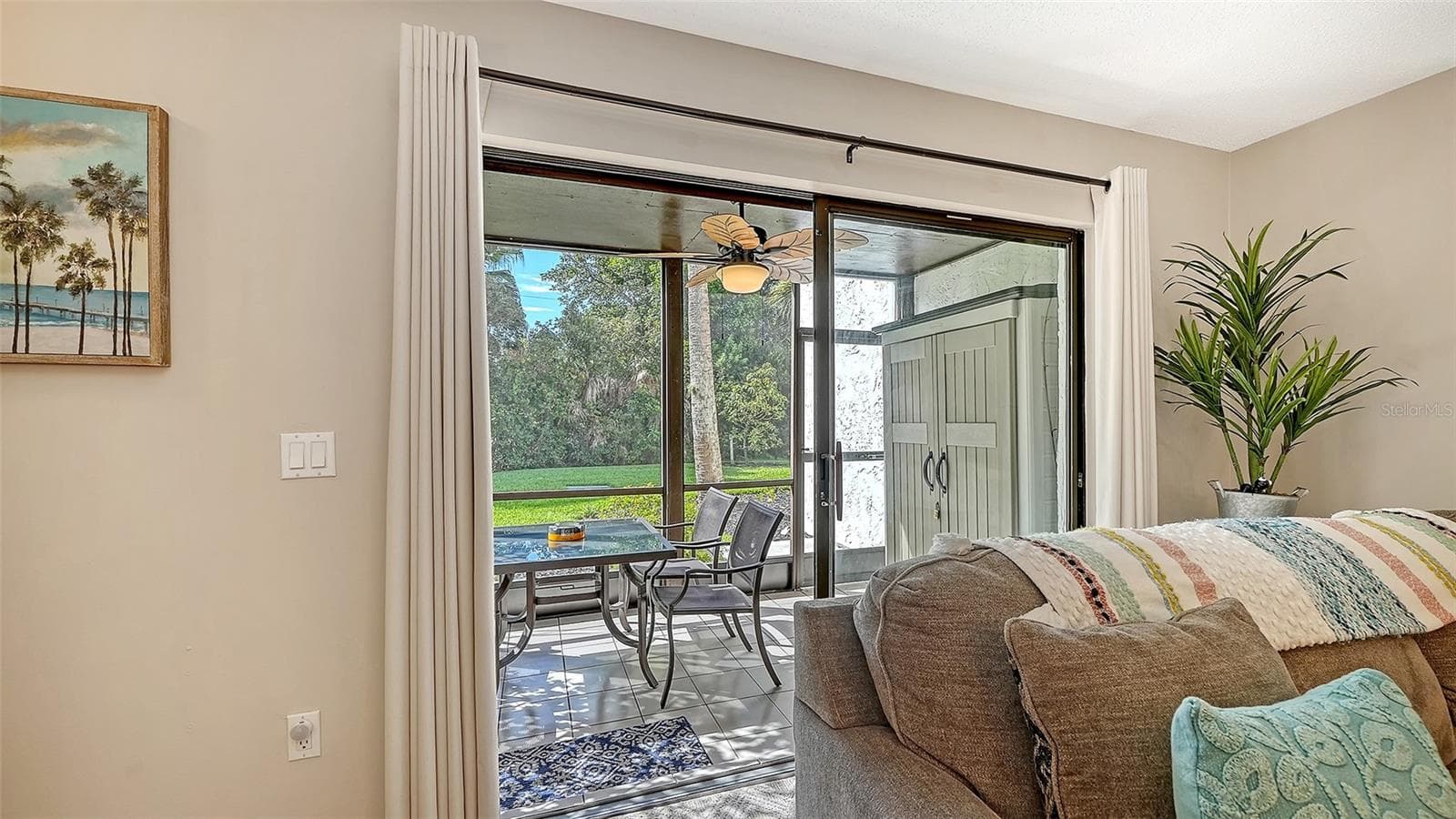 Living Room opens to screened and covered lanai. - 1646 STICKNEY POINT RD #101, SARASOTA