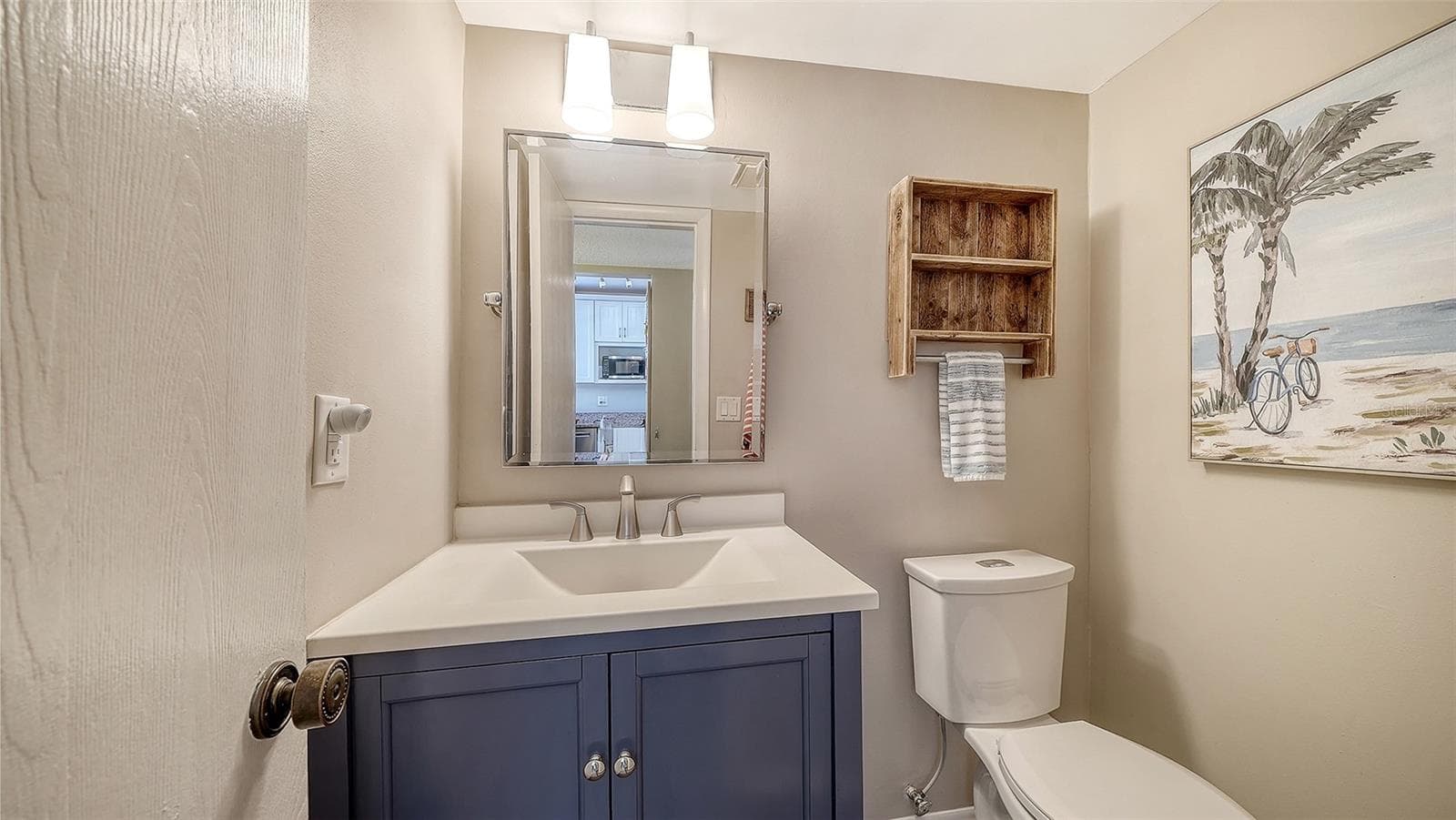 Powder Room/Half-Bathroom on ground floor. - 1646 STICKNEY POINT RD #101, SARASOTA