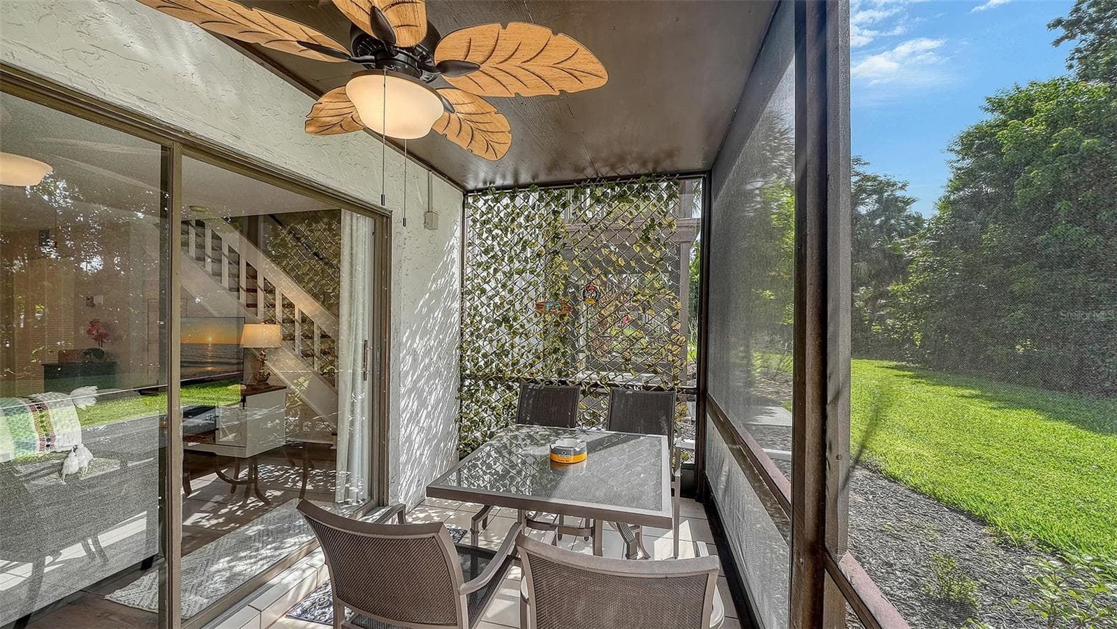 Screened and Covered Lanai on the ground floor off Living Room. - 1646 STICKNEY POINT RD #101, SARASOTA