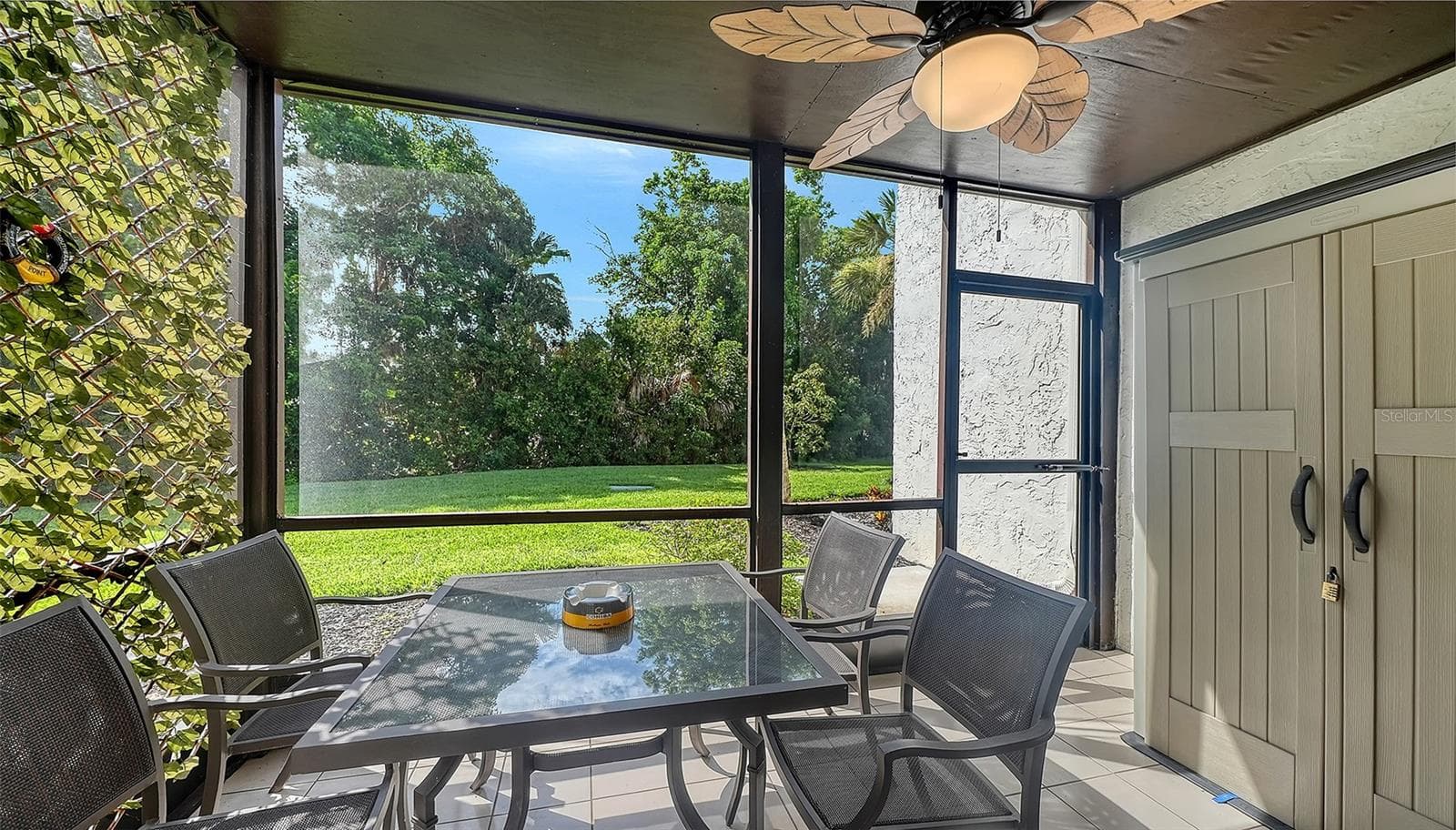 Screened and Covered Lanai on the ground floor. - 1646 STICKNEY POINT RD #101, SARASOTA