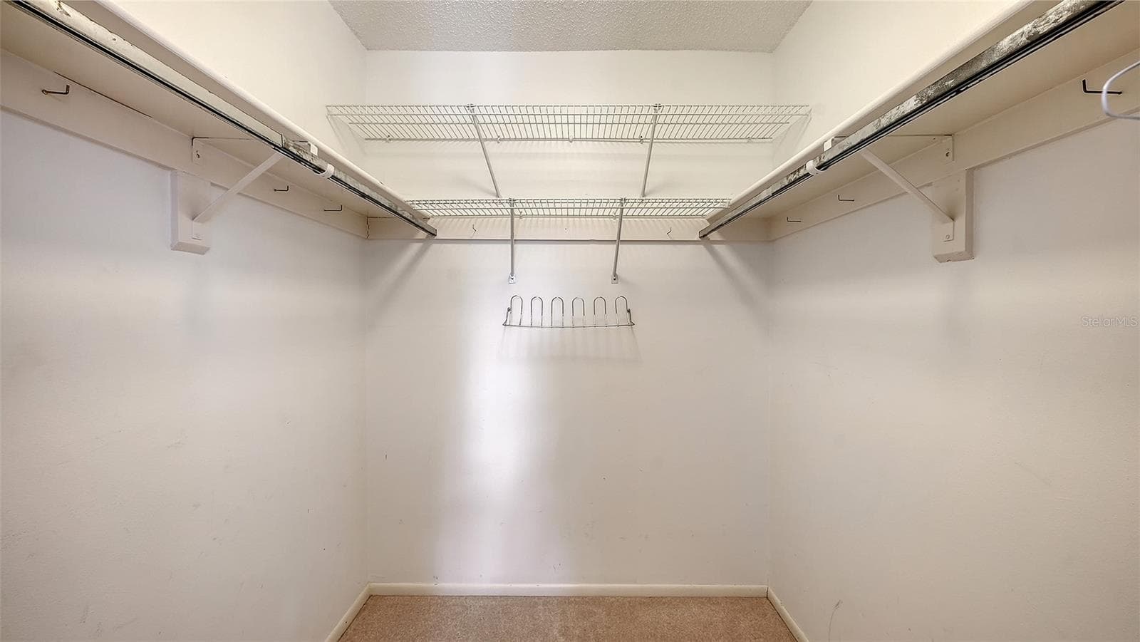 Primary Bedroom, second floor walk-in Closet. - 1646 STICKNEY POINT RD #101, SARASOTA