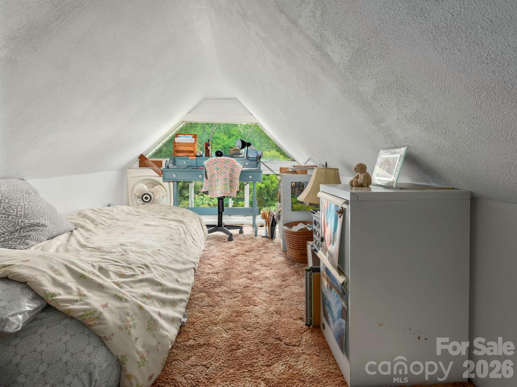 Bright cozy loft area in primary bedroom! Sellers use this side for an office and the other side for storage. - 46 Perennial Ridge, Weaverville