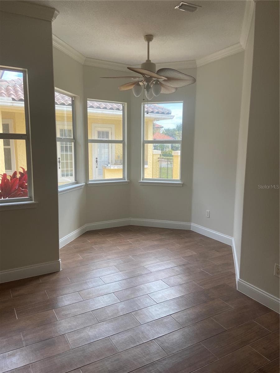 Spacious primary bedroom with sitting area /desk area - 88 HIDDEN CV, FLAGLER BEACH