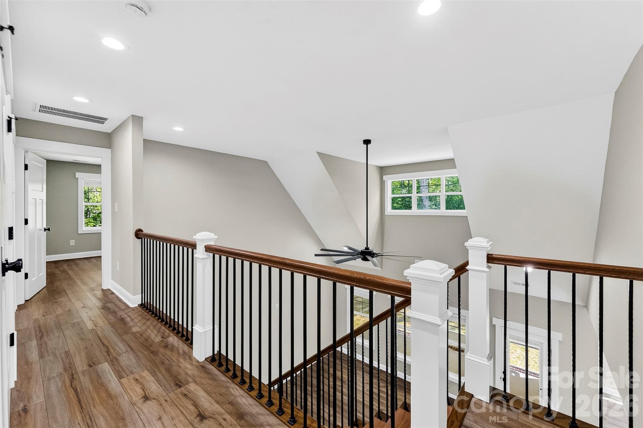 Upstairs hallway overlooking great room - 5005 Oconee Drive, Stanley