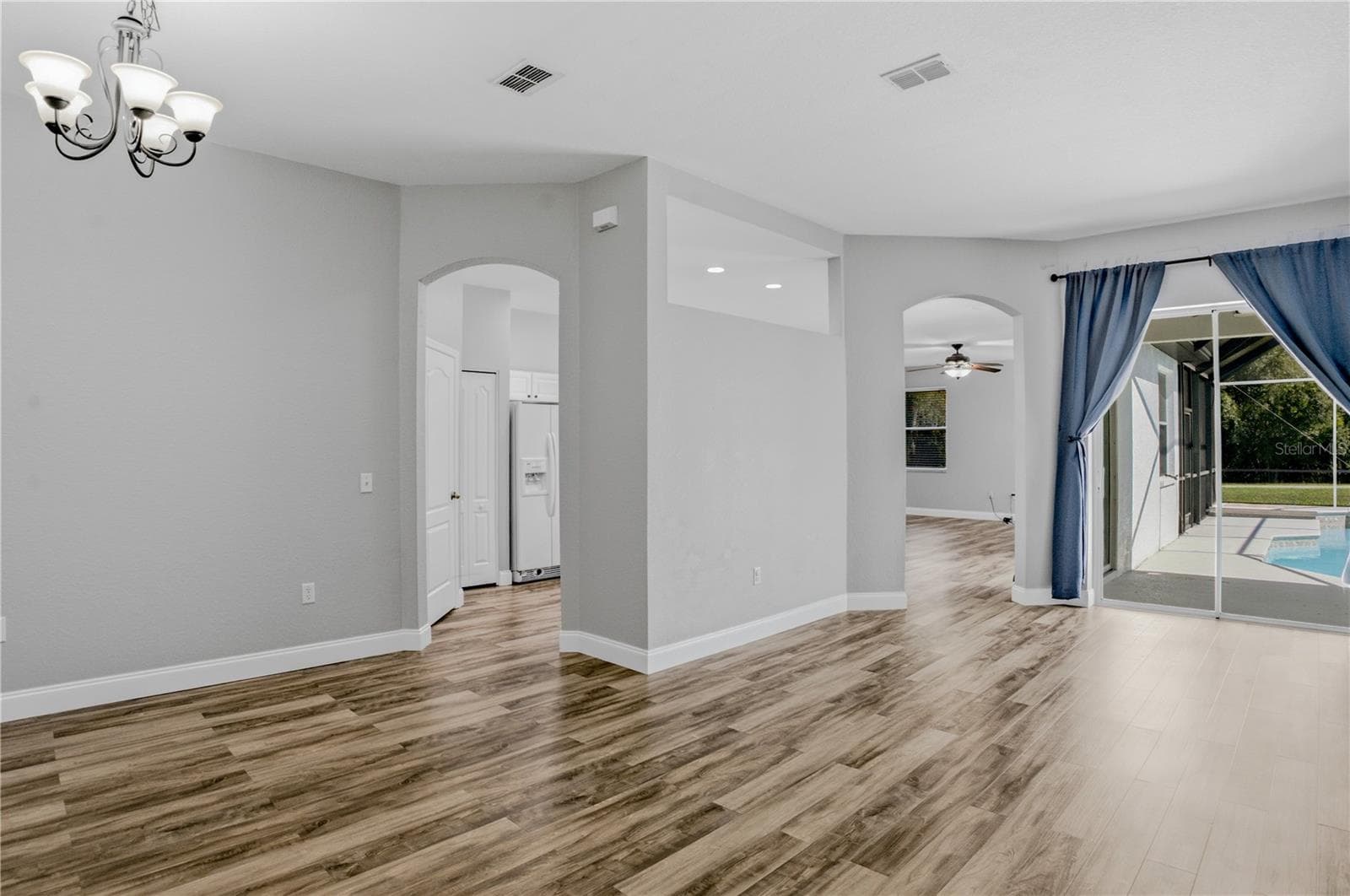 VIEW FROM FOYER-LIVING ROOM TO RIGHT DINING ROOM TO LEFT AND KITCHEN ENTRANCE - 1710 BROOKSTONE WAY, PLANT CITY