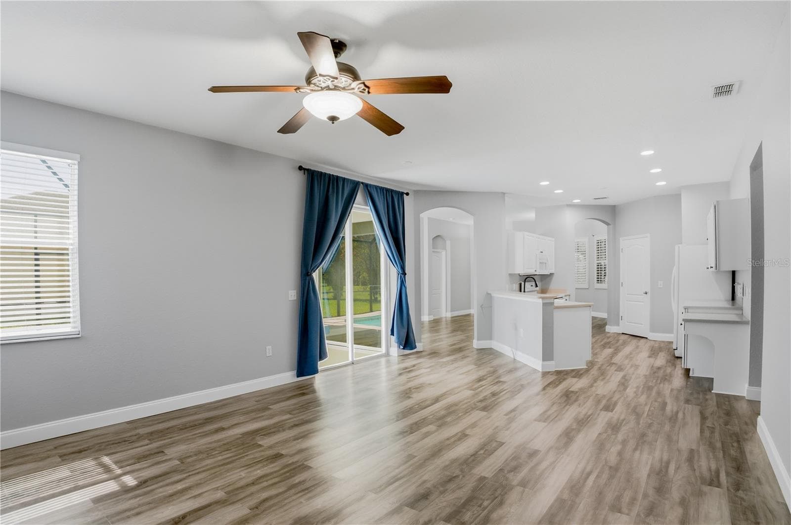 FAMILY ROOM LOOKING BACK INTO KITCHEN AND LIVING ROOM ENTRANCE - 1710 BROOKSTONE WAY, PLANT CITY