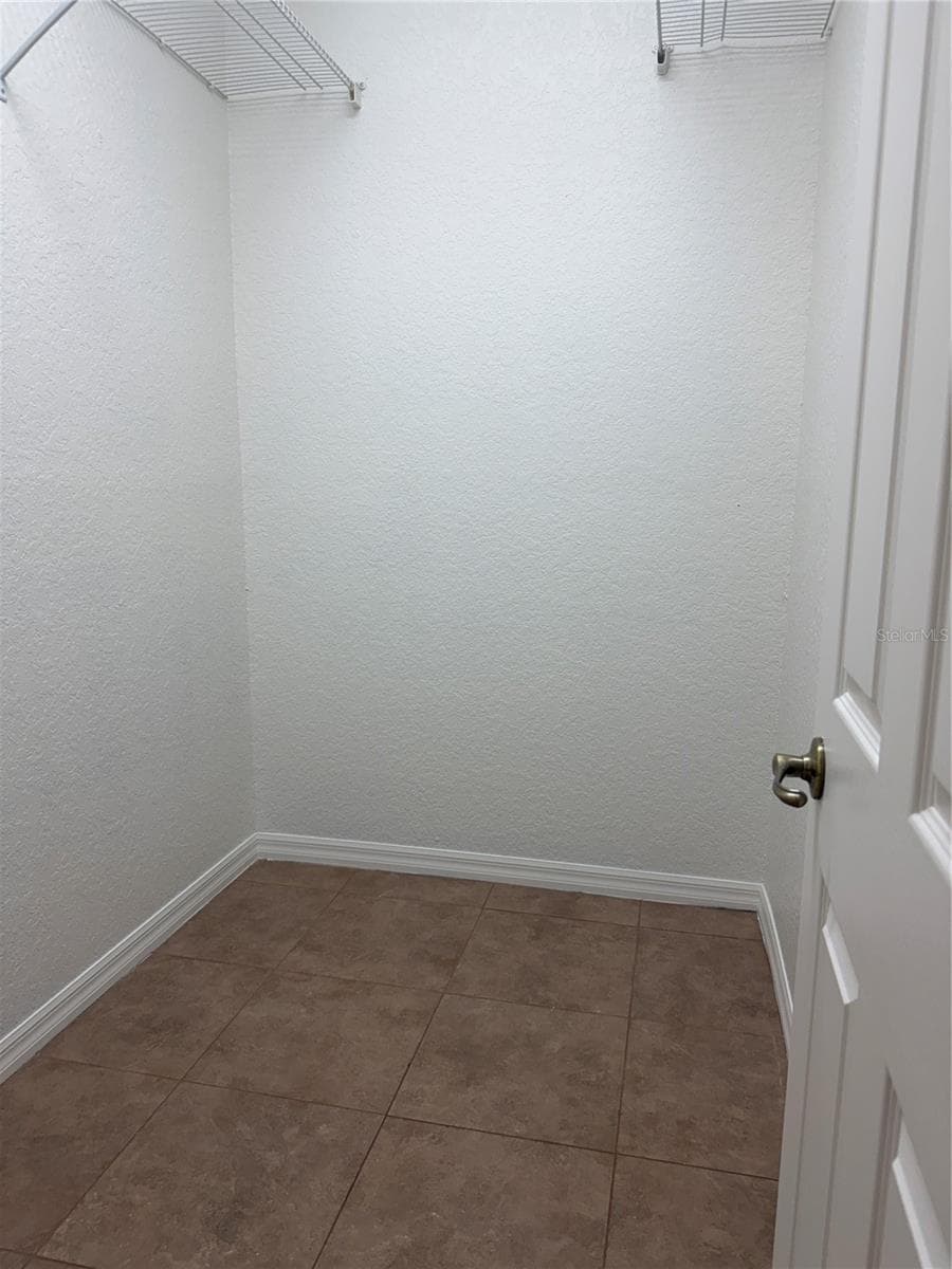 primary bedroom closet #2 - 24087 TWISTER LN, BROOKSVILLE