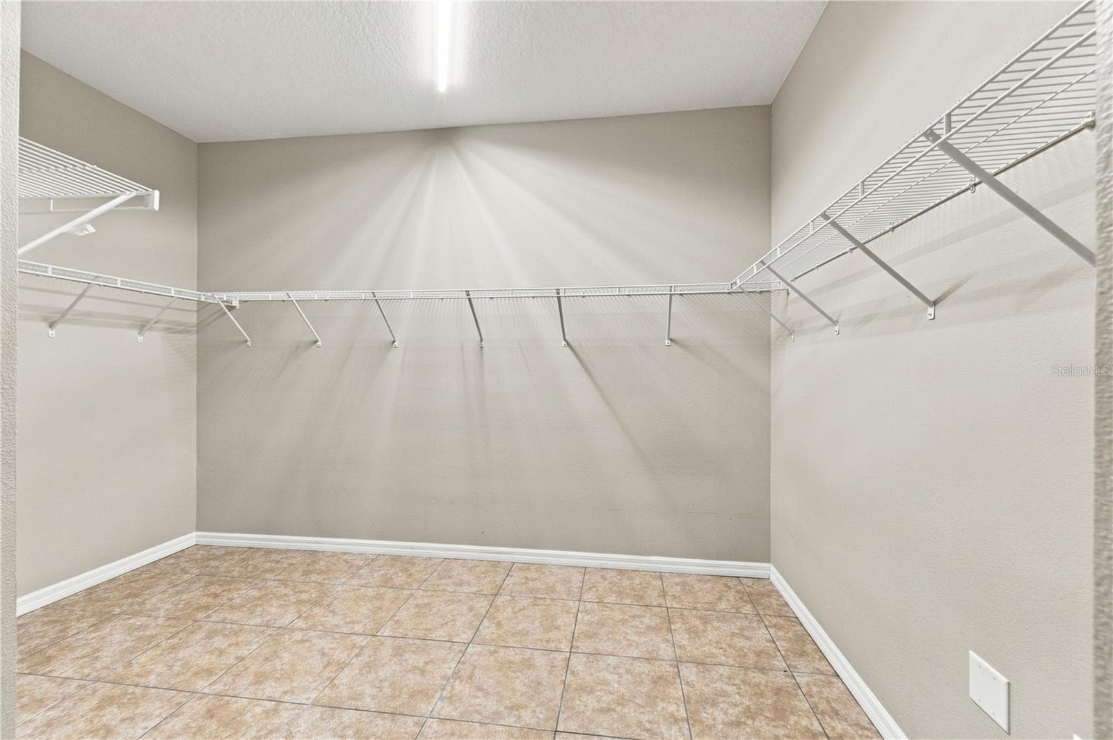 Primary walk-in closet - 13366 BARKINGSIDE PL, SPRING HILL
