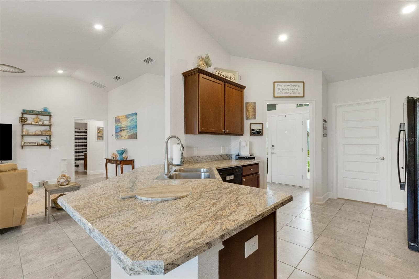 Solid surface countertops and two-bowl stainless steel sink with gooseneck pulldown faucet. - 220 HERITAGE PARK LN, MULBERRY