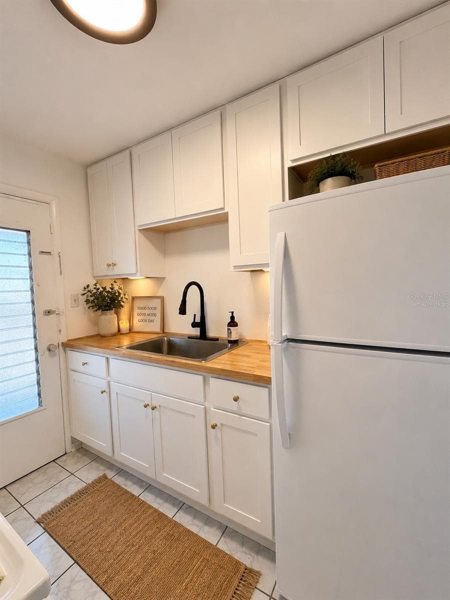 Virtually staged Kitchen - 1700 6TH ST NW #A38, WINTER HAVEN