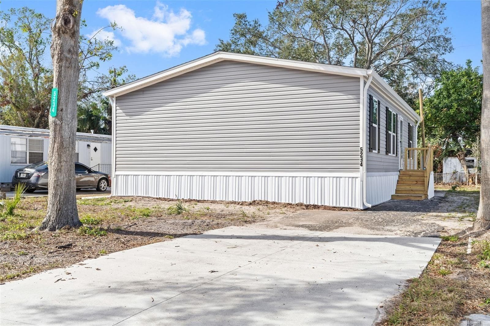 Manufactured Home at 5234 YELLOW PINE ST N, ST PETERSBURG, photo 2 of 26