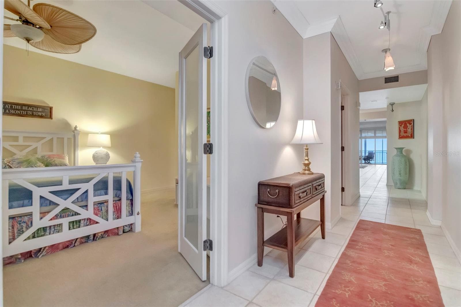 Entrance Hall way with Gulf Beach views - Guest bedroom with its own Bathroom ensuite and walk-in- Split Floor Plan for added privacy - 2 15TH AVE #303, INDIAN ROCKS BEACH