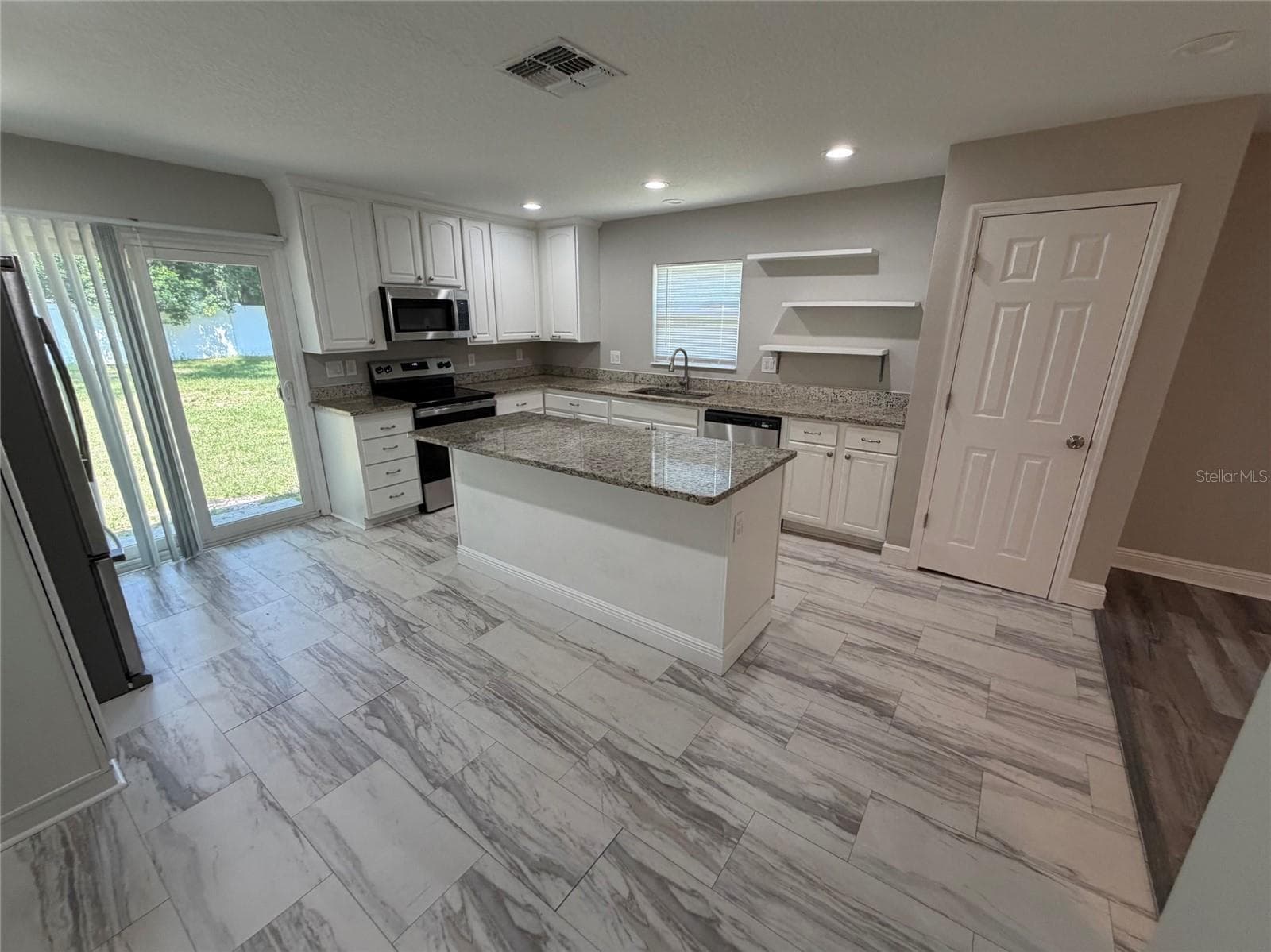 Single Family Residence at 312 WADE AVE, DELAND, photo 8 of 25